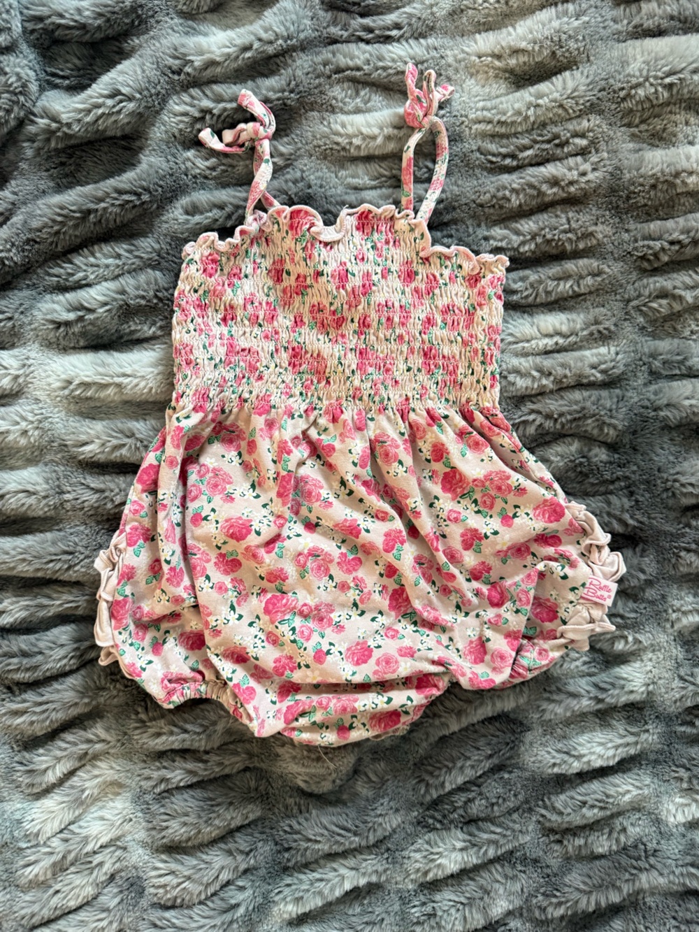 Ruffle Butts Pink Floral Smocked Romper